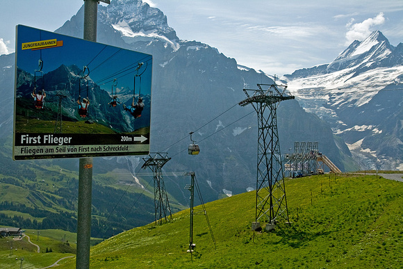 To the right of the cable car tower is a Zip Line...see the billboard.
